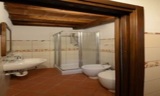 Nizza Monferrato House | Palazzo centro Bilocale with double bed and balcony