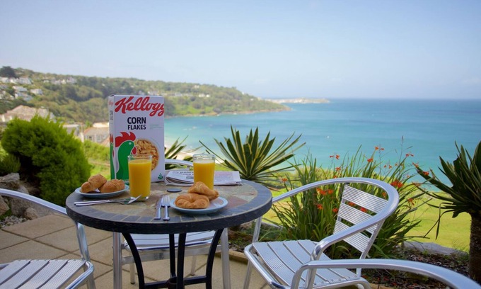 Carbis Bay Apartment | Prime seaside location, wonderful sea terrace and gardens, car parking, Wifi