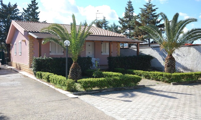 Campofelice di Roccella Villa | villa a few steps from the sea, surrounded by greenery, sleeps 6