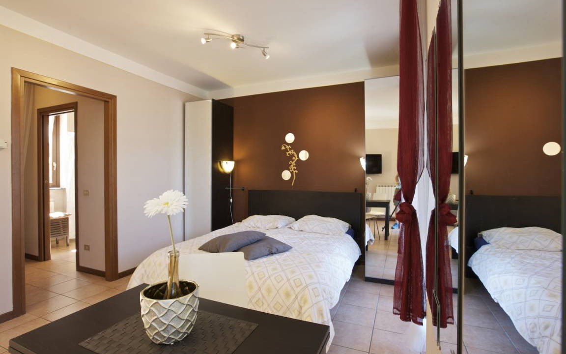 Photo of Bedroom in Maccagno con Pino e Veddasca