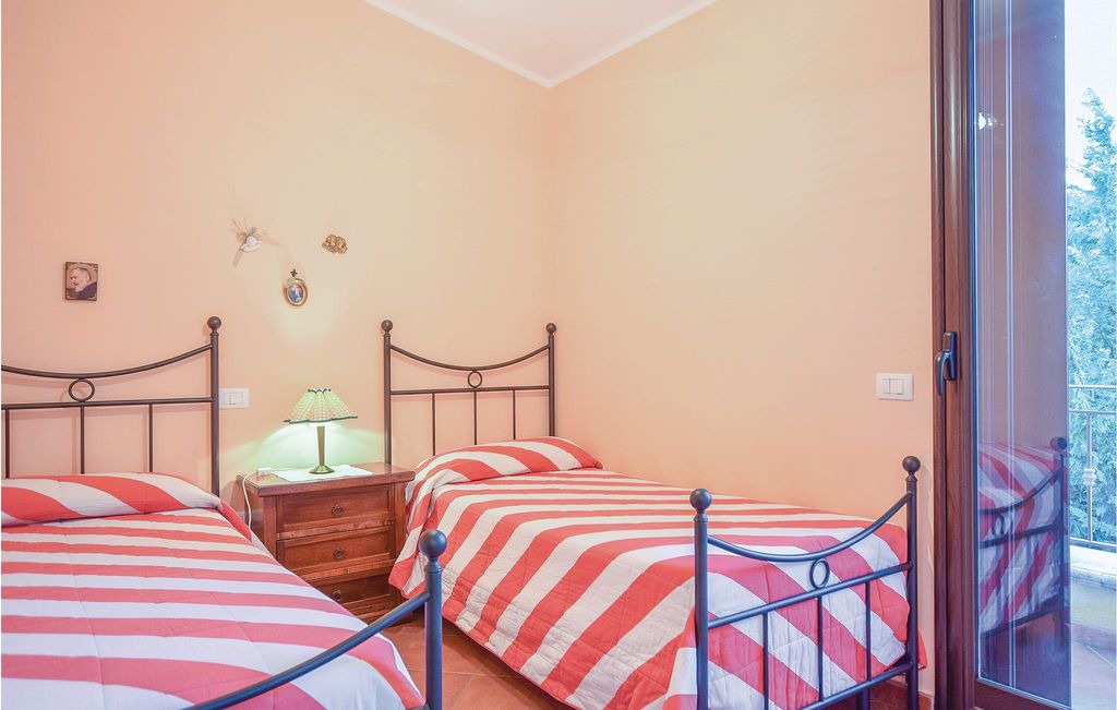 Photo of Bedroom in Torre Colonna-sperone