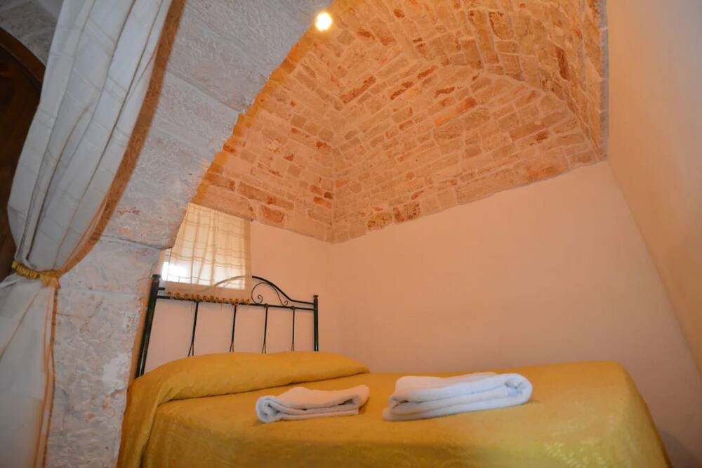 Photo of Bedroom in The Trulli of Alberobello