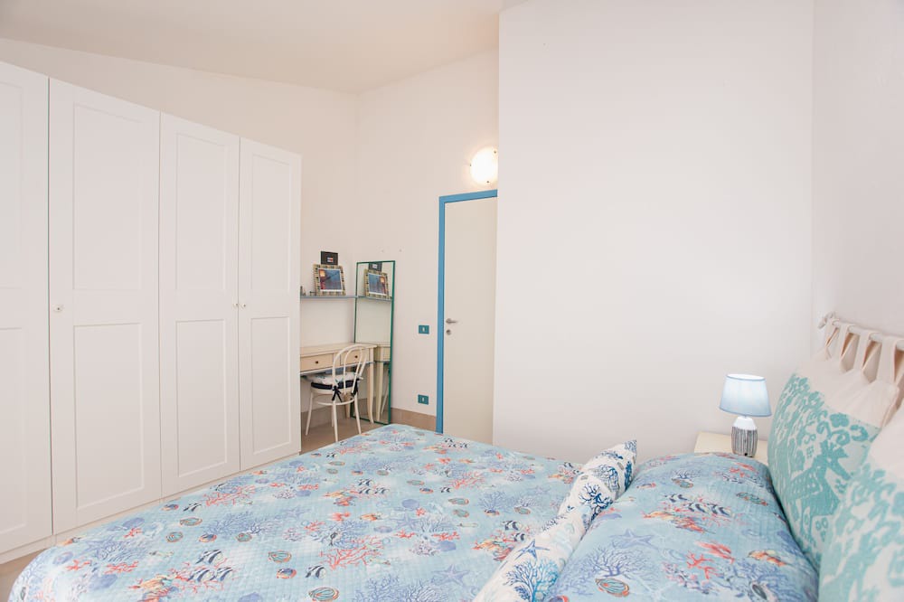 Photo of Bedroom in Capo Coda Cavallo