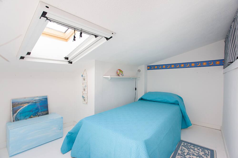 Photo of Bedroom in Capo Coda Cavallo