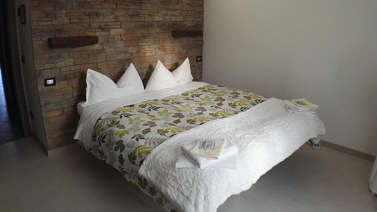Photo of Bedroom in Brolo