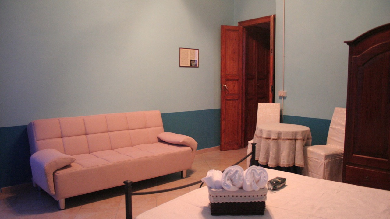 Photo of Bedroom in Iglesias Historic Centre