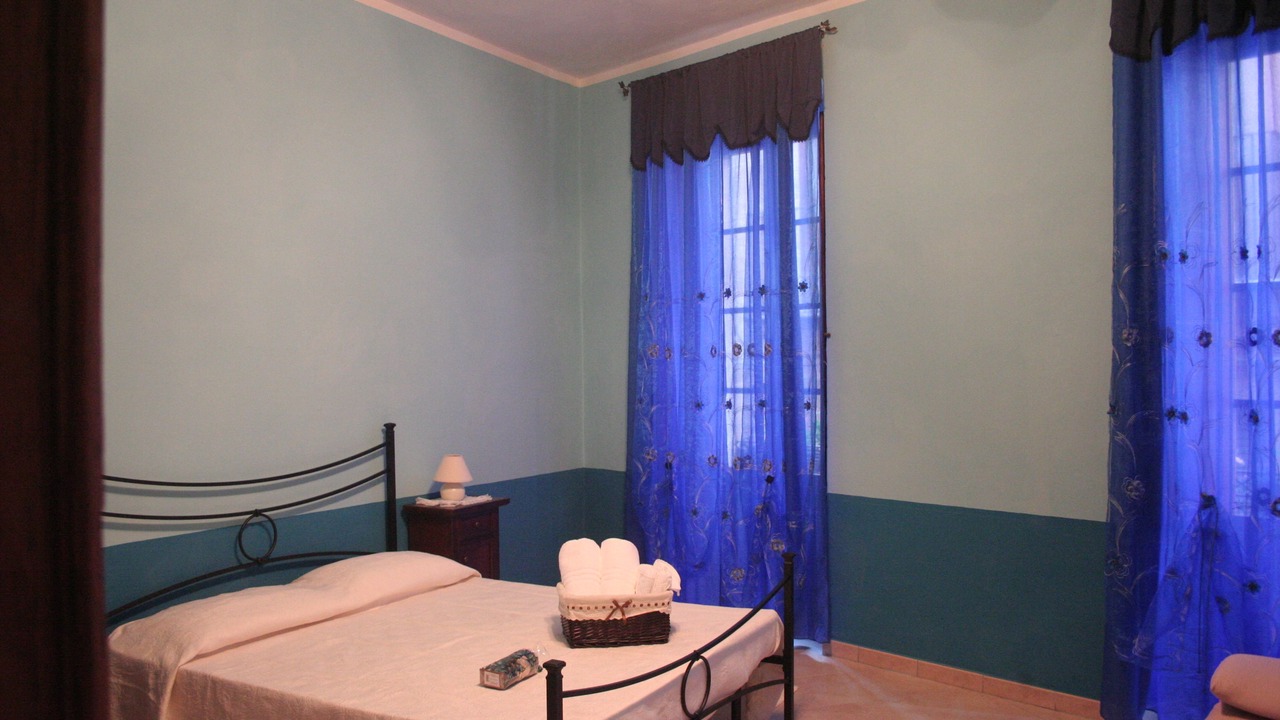 Photo of Bedroom in Iglesias Historic Centre