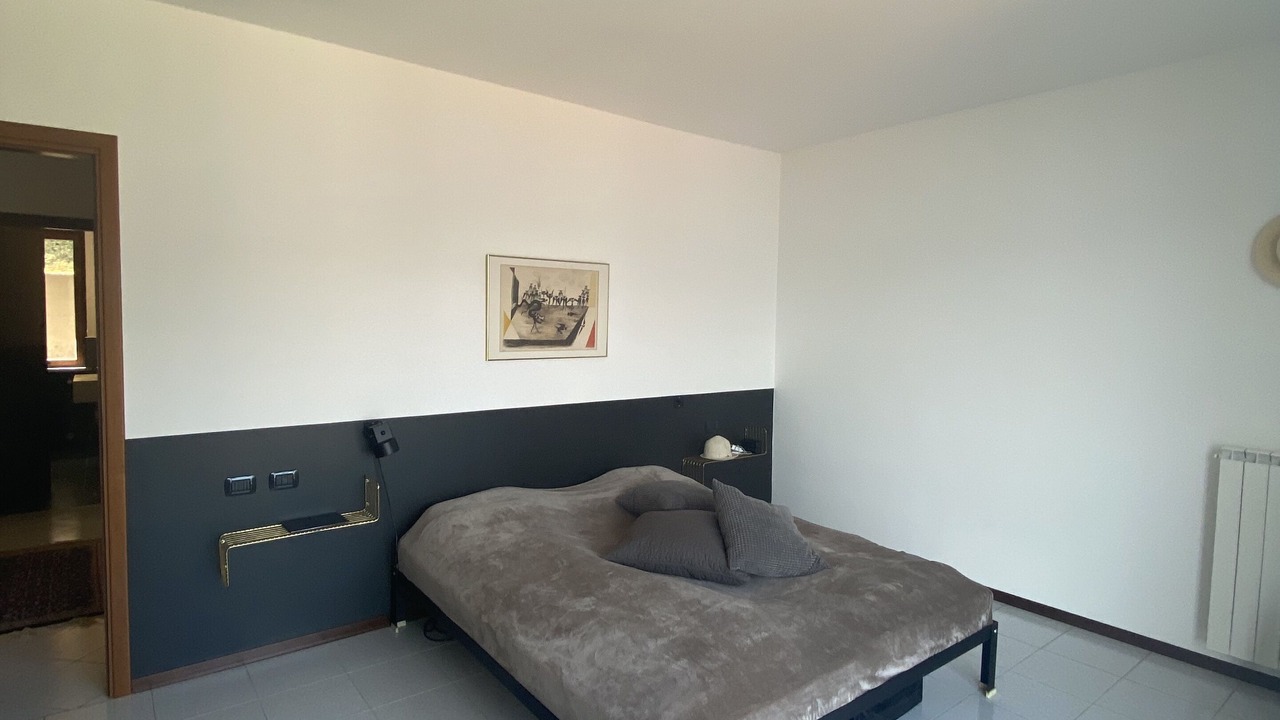 Photo of Bedroom in Maccagno con Pino e Veddasca
