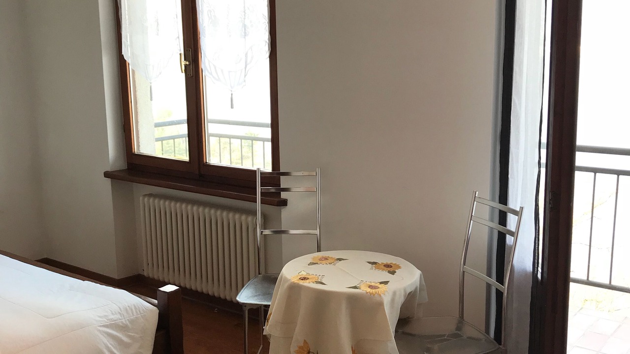 Photo of Bedroom in Claino Con Osteno