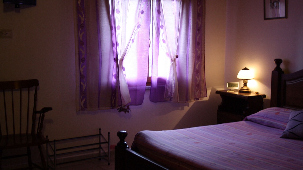 Photo of Bedroom in Iglesias Historic Centre