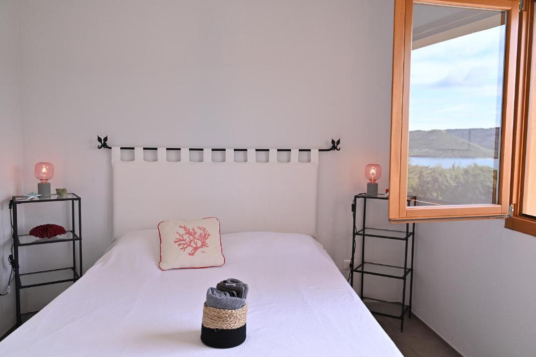 Photo of Bedroom in Capo d'Orso