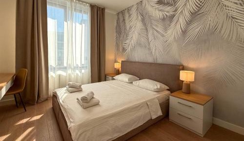 One-Bedroom Apartment with Balcony and City View