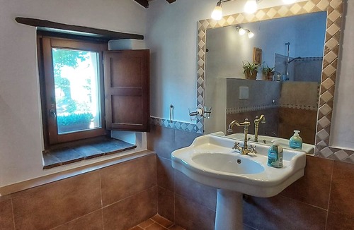 Penna San Giovanni House | San Isidore, a meticulously restored historic Italian home with a stunning pool.